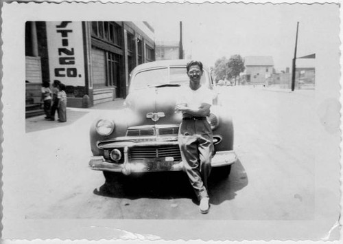 Yoshio Harry Tsuruda leaning against car in Los Angeles