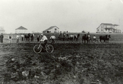 Mr. Kawada on bicycle in Elk Grove