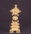 Miniature wooden shrine painted gold and black