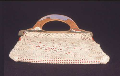White crocheted purse with wooden handles