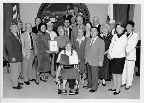 Group of people at the presentation of the Governor's Historic Preservation Award for the Japanese American Archival Collection at California State University, Sacramento