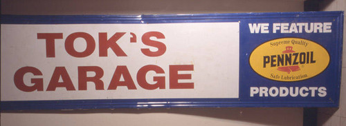 Tok's Garage sign