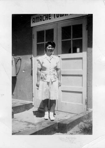 Viola Sadako Nakano at the entrance of the Granada Relocation Center Town Hall