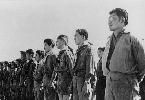 Boy Scout troop participating in labor day parade at Tule Lake Relocation Center