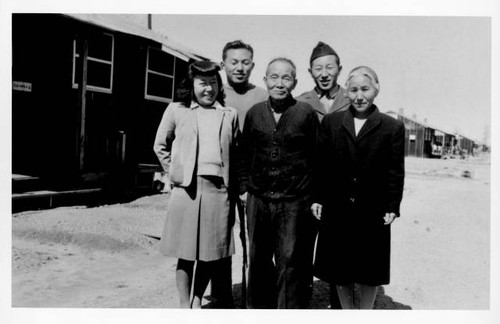 Ishikawa family outside of barracks at Jerome Relocation Center