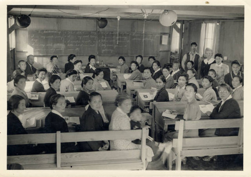 Mary Courage with english class at Poston II Relocation Center