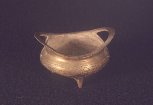 Brass bowl with handles to hold incense