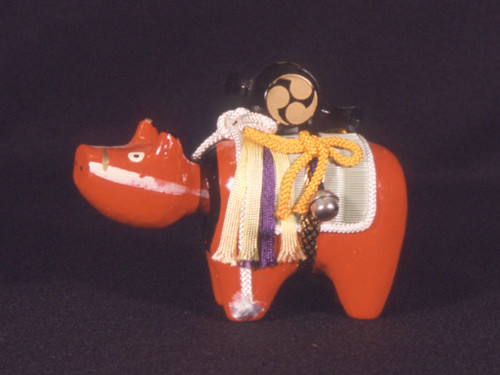 Red cow toy with bobbing head