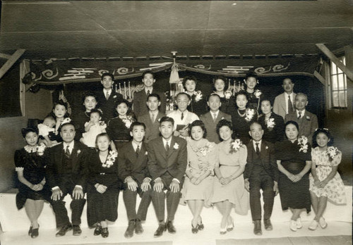 Group of Japanese Americans at wedding of May Asai and Hachiro Shinbo at Tule Lake Relocation Center