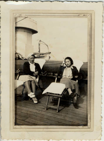 Ruth Nakano and unidentified woman seated on deck aboard the Chichibu Maru of the Nippon Yusen Kaish Line