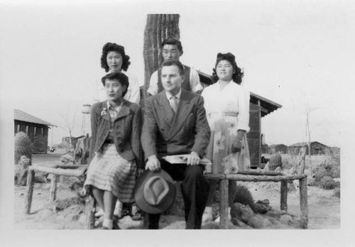 Dallas McLaren and group outside at Poston II Relocation Center