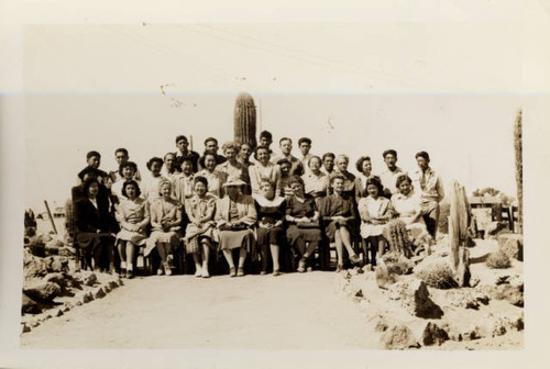 Group of teachers[?] and staff[?] outside Poston II Relocation Center