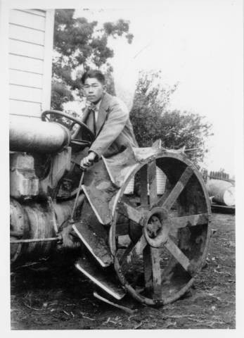 Walter Tsukamoto on tractor