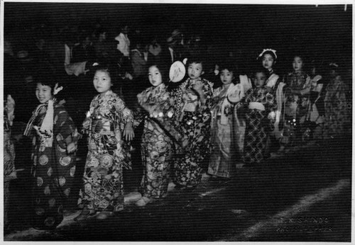 Parade of children dressed in traditional Japanese clothing for Obon Festival at the Sacramento Buddhist Church