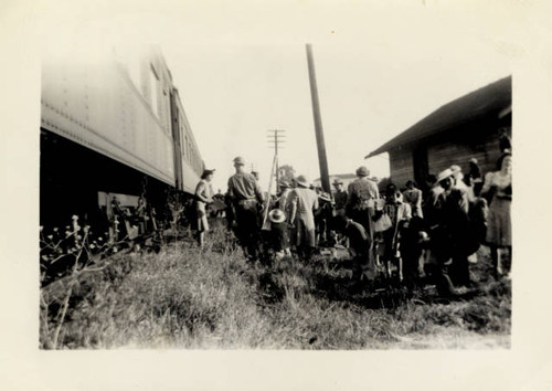 Japanese Americans boarding train in Elk Grove for the relocation centers