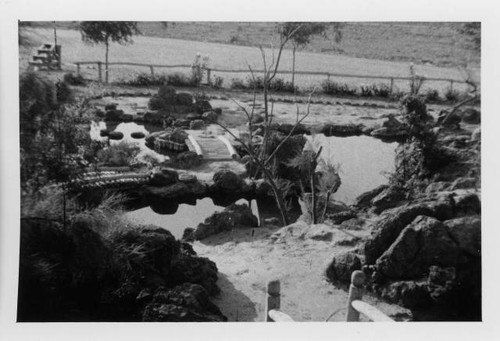 Pond in Japanese garden at Posten Relocation Center