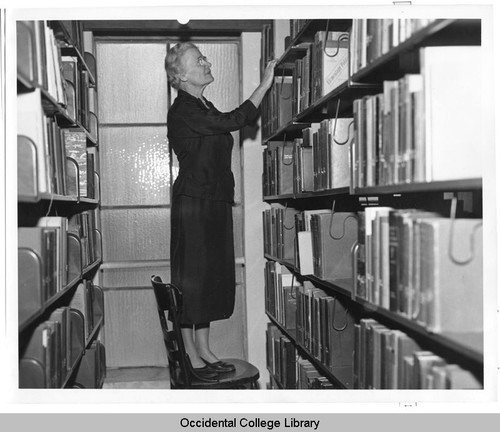 Elizabeth McCloy, College Librarian, Occidental College, in the stacks