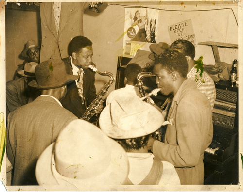 Saxophone players performing in nightclub