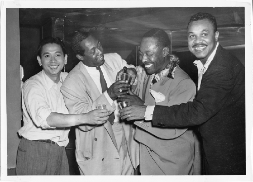 Four unidentified men with beer and glasses