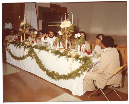 Group seated at banquet table