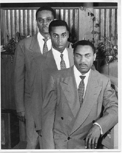 Musicians Bob Lewis (bass), Norvell Randell (piano), Eric Miller (guitar)