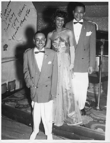 Photograph of three performers on stage at Slim Jenkins nightclub Oakland, California