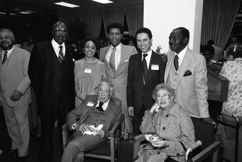 Dr. H. Claude Hudson posing with family at his 98th birtday celebration, Los Angeles, 1984