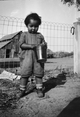 Gloria Pearl Roberts holding bucket