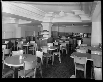 Soda fountain and seats inside restaurant