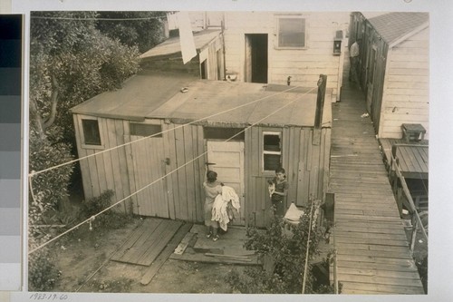 These boys can continue sleeping on the ground, delighted to do without baths, until heavy October rains begin. After that their father plans to quit the shipyards and go somewhere else "unless we find us a house to live in. There aren't any now. We've looked everywhere..."