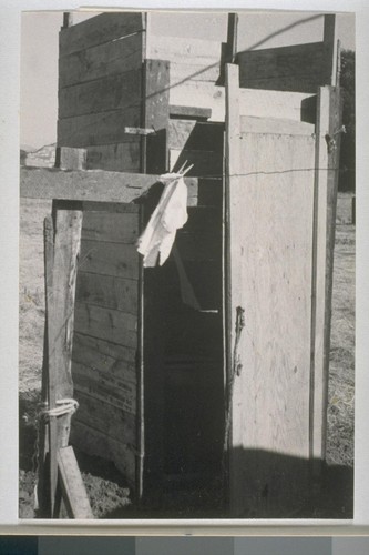 Typical privies - scores of them have been hurriedly erected - that serve Richmond Shipyard workers. Other families, living within a block or two of brush-lined Richmond "creeks" that are dry at this time of year, use the gravelled creek beds as latrines. After heavy rains, these lowlands overflow