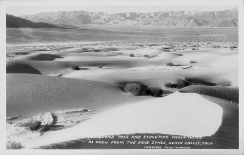 Townsend Pass and Stovepipe Wells Hotel as seen from the Sand Dunes, Death Valley, Calif