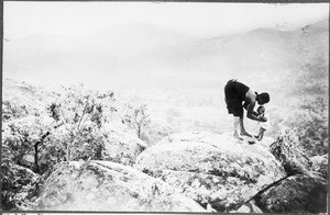 Woman abandoning a baby in the Pare Mountains, Tanzania, ca.1927-1938