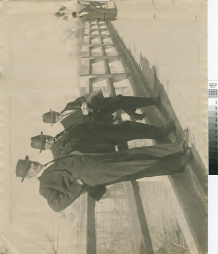 George Whitaker, Austin Foster Stoner, and Mr. Herpel on bridge