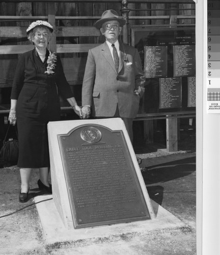 Mr. and Mrs. Ripley with memorial plaque