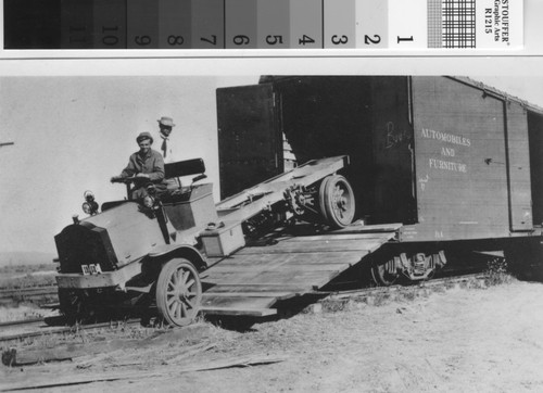 Unloading a Packard truck