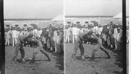 A wrestling match in the marketplace of Cebu. Philippine Islands