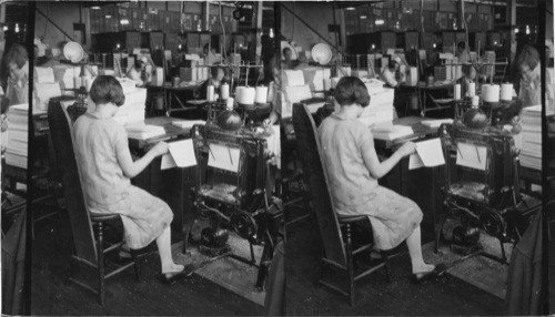 Smythe Sewing Machine - sews backs of books or magazines, capacity about 2400 signatures a day. Camden, N.J