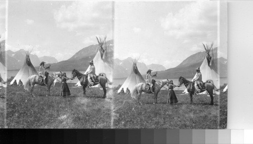 Blackfeet Indians in front of Teepees. Glacier National Park, Montana