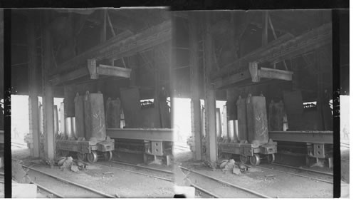Interior of a stripper - removing molds from red-hot ingots. Homestead, Penna