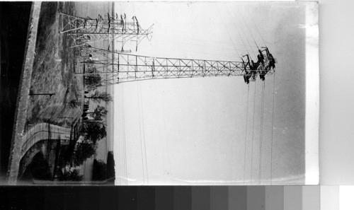 TVA [Tennessee Valley Authority] - Transmission tower and lake above the Wilson Dam at Florence, Ala