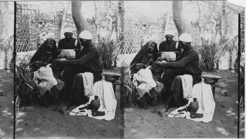 Barber at work in the shade, Cairo, Egypt