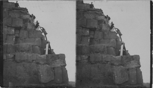 Climbing the Pyramid of Cheops, Egypt