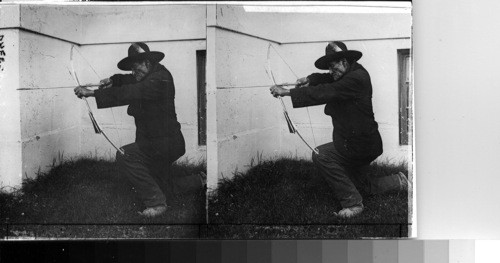 Geronimo, shooting an arrow, St. Louis Exposition, Missouri