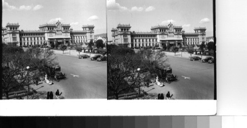 Looking across Parque Central at Sixth Avenue toward the National Palace, an attractive building in pale grey-green stone, where the senate chamber and other principal government offices are located. Guatemala City, Guatemala, Central America