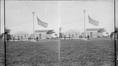 An American Camp. American Flag in Foreground. Cuba