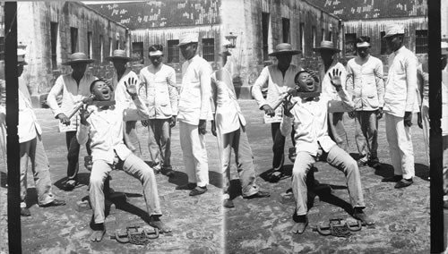 Garroting a criminal at the Balebid Prison. Manila. P.I. Execution Chamber and Garrot, Manila. War view, 1899