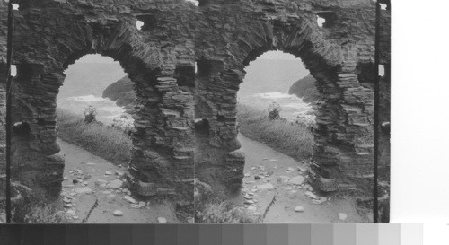 Legendary site of King Arthur's Castle. The arched portal of the ruined Tintagel Castle, Tintagel Head, Cornwall, England