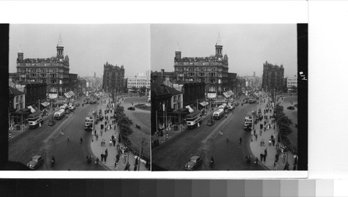 Belfast: afternoon traffic on Donegall square looking east