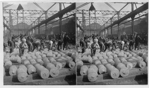 Trimming and marking round ingots of fine steel to export for shell making. Homestead, Penna